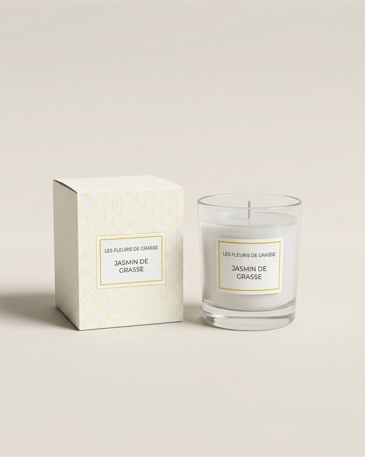 Bougie parfumée 130 g Jasmin de Grasse, verre et coffret, vue de face sur fond pierre