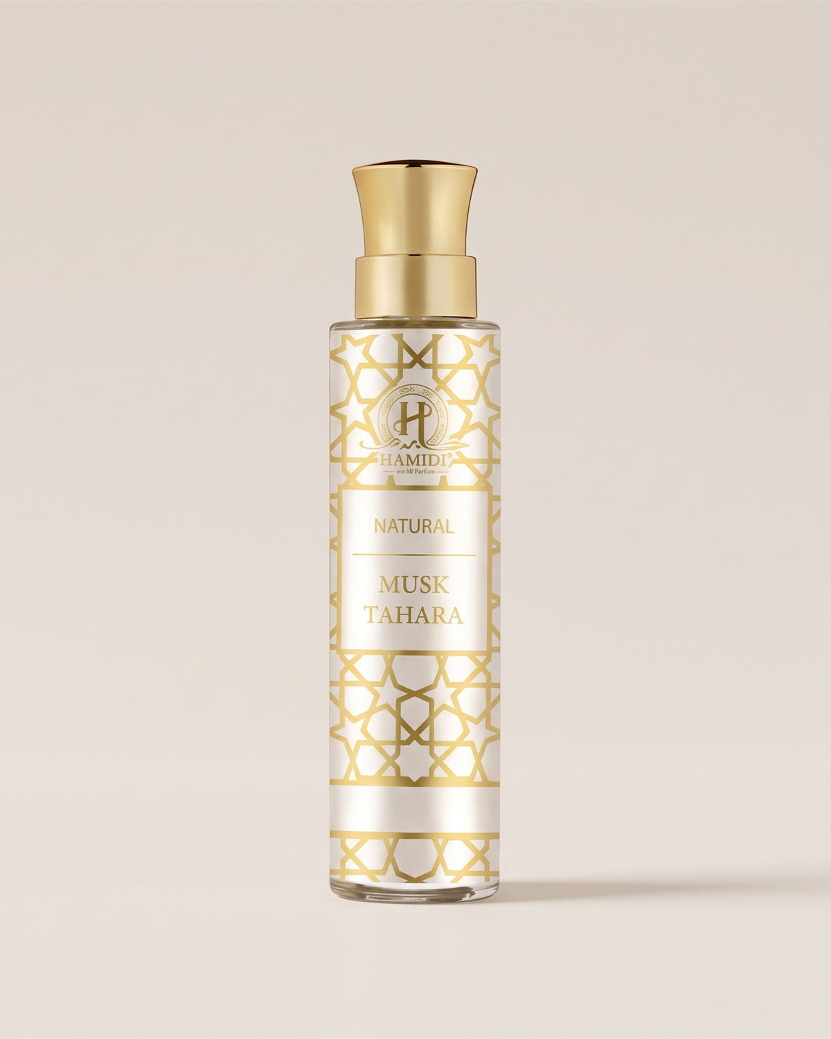 Eau de parfum sans alcool Musc Tahara de Hamidi, flacon blanc nacré à motif doré