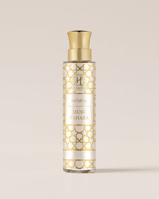 Eau de parfum sans alcool Musc Tahara de Hamidi, flacon blanc nacré à motif doré