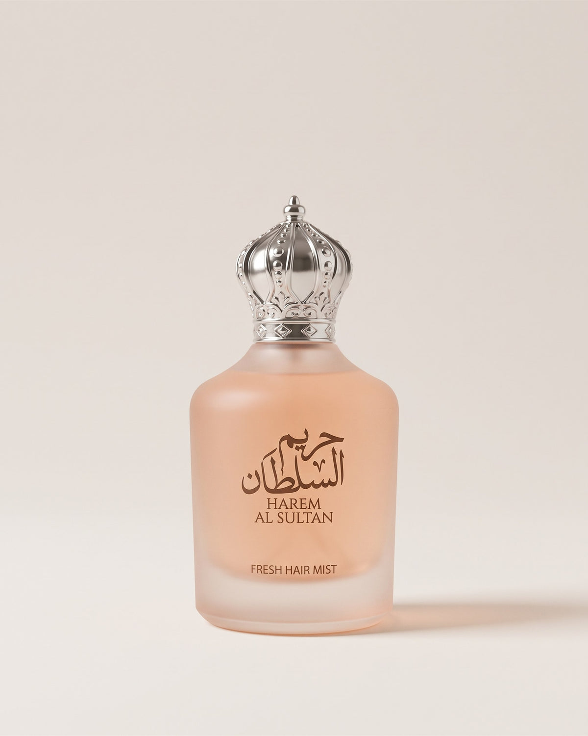 Brume parfumée pour cheveux Hareem Al Sultan, flacon givré pêche à bouchon couronne