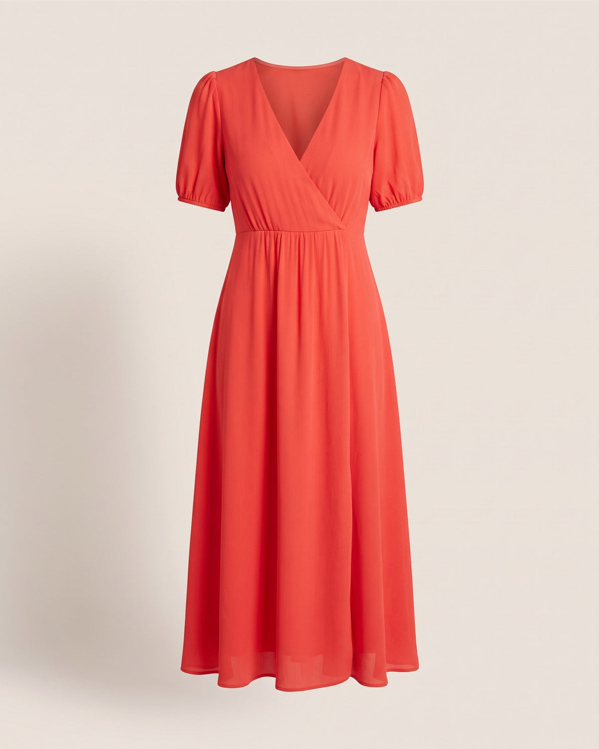 Robe Romane rouge à col V et manches bouffantes, vue de face sur fond pierre