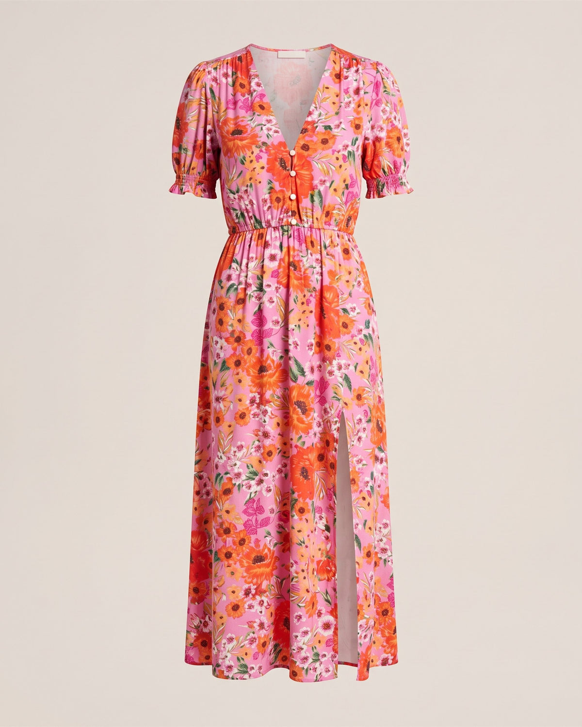 Robe longue fleurie en viscose à col V boutonné, vue de face sur fond pierre