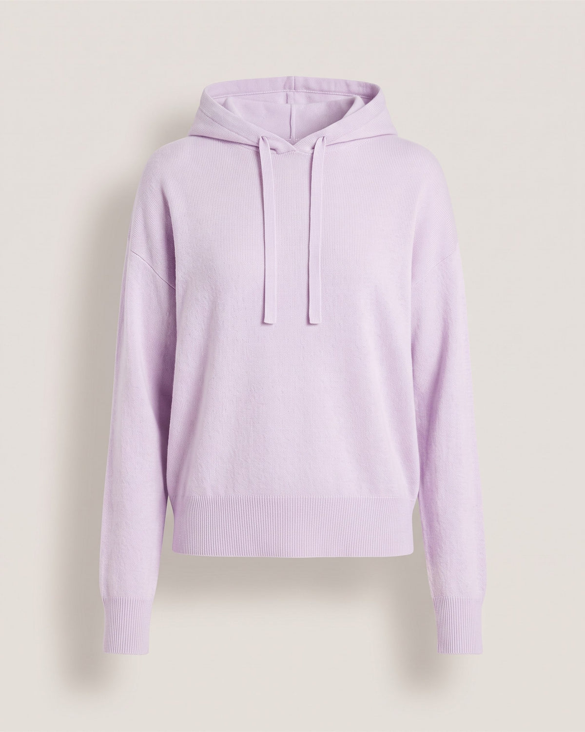 Sweat à capuche lilas en cachemire MIA 16, vue de face sur fond pierre