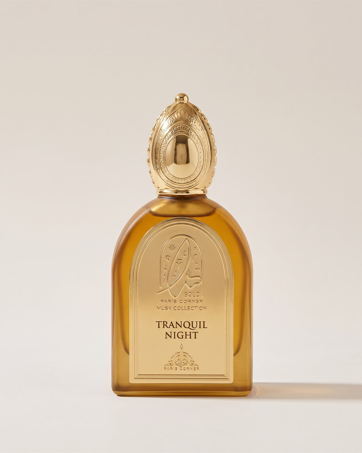 Eau de parfum Tranquil Night de Musk Collection Paris Corner, flacon ambré doré en arche